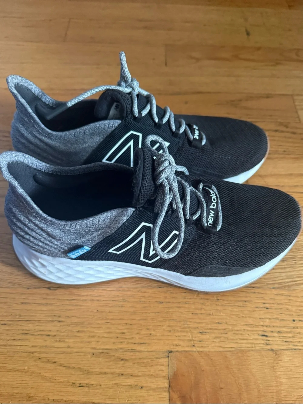 New Balance Women’s Black & Gray Athletic Sneakers with White Midsole